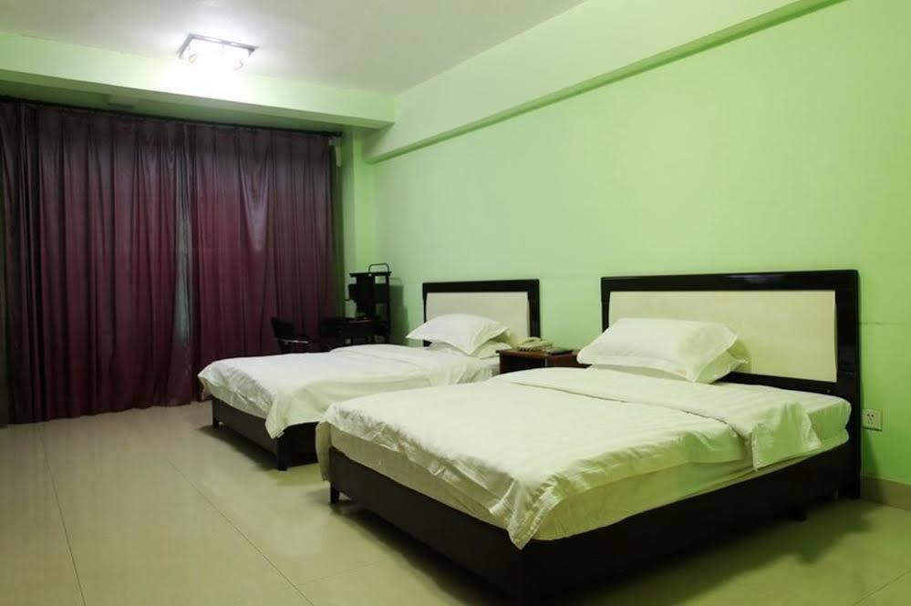 Taohuayuan Apartment Hotel Наньнин Экстерьер фото